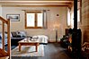 Open plan living area with log burner